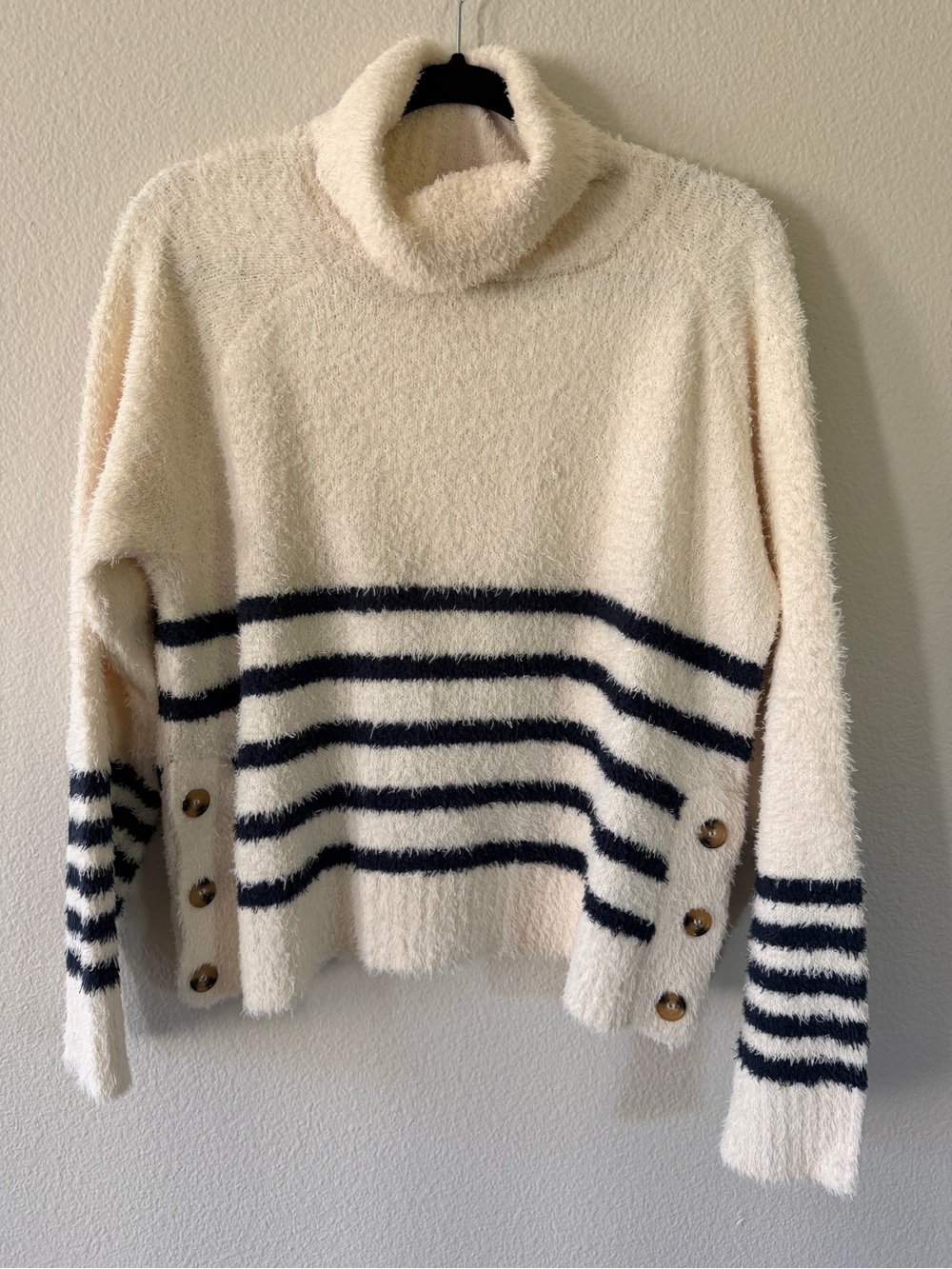 Cozy Cream Turtleneck Sweater with Navy Stripes